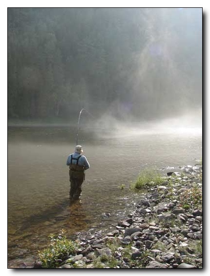 George Kenna with a fish on at Diamond
