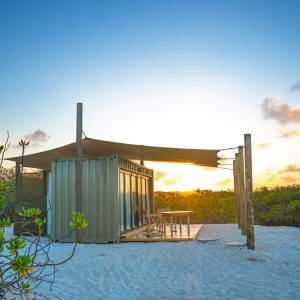 Cosmoledo beach cabana at the waterline, Seychelles