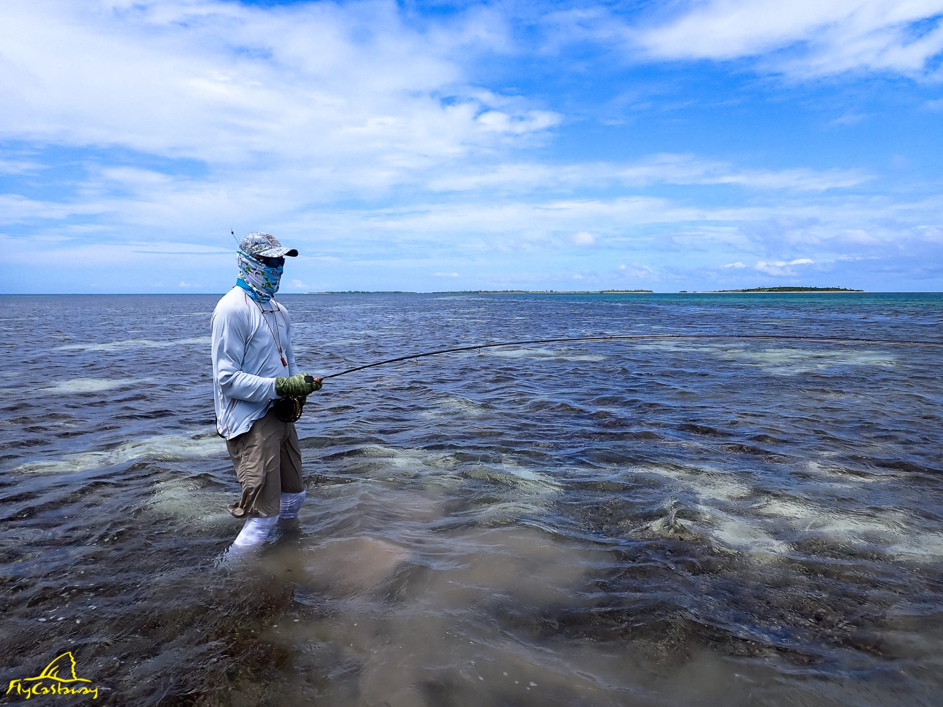Angler wading the flats — Providence Atoll, Seychelles