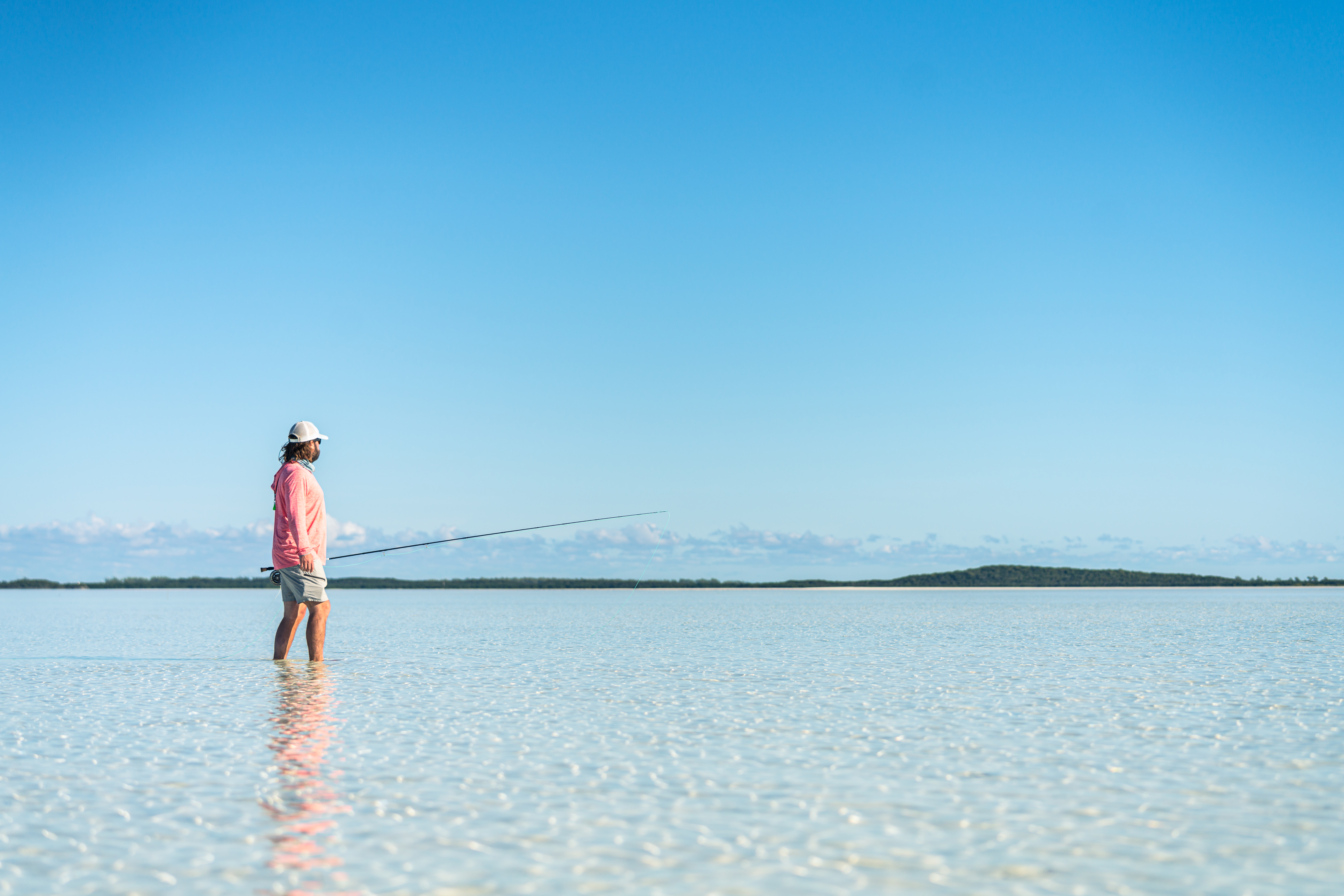 Pristine Bahamas bonefish flat with calm water and clear skies after hurricane, showing ideal post-storm fishing conditions