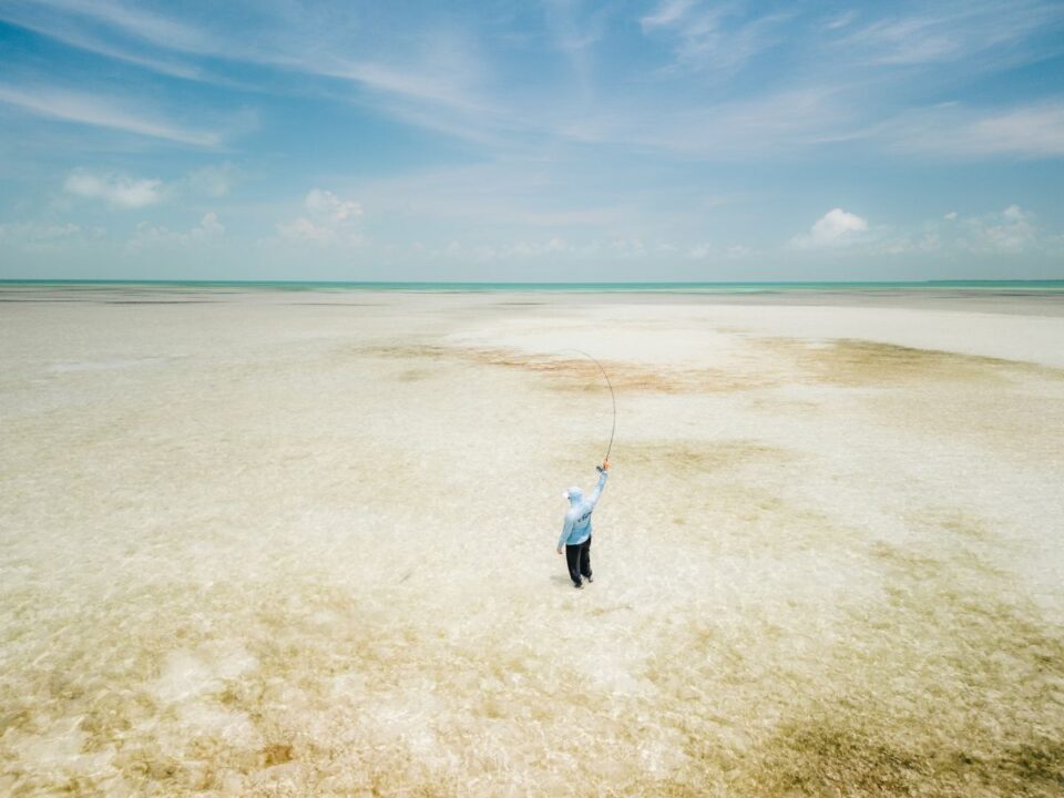 Angler Casting Sand Flat Aerial — Sian Kaan Lodge, Ascension Bay Mexico
