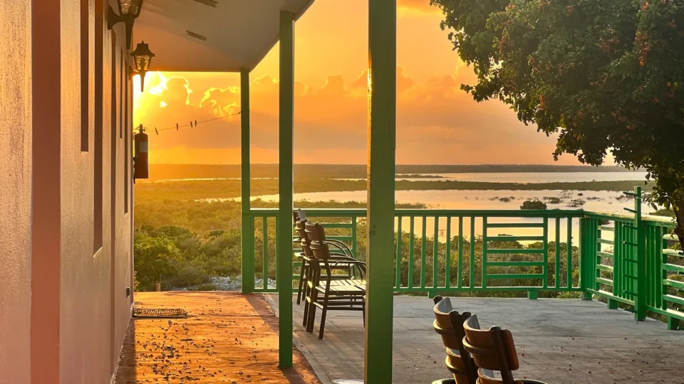 Sunset over Relief Bay from the porch at Grey’s Point Inn, Acklins Island, Bahamas