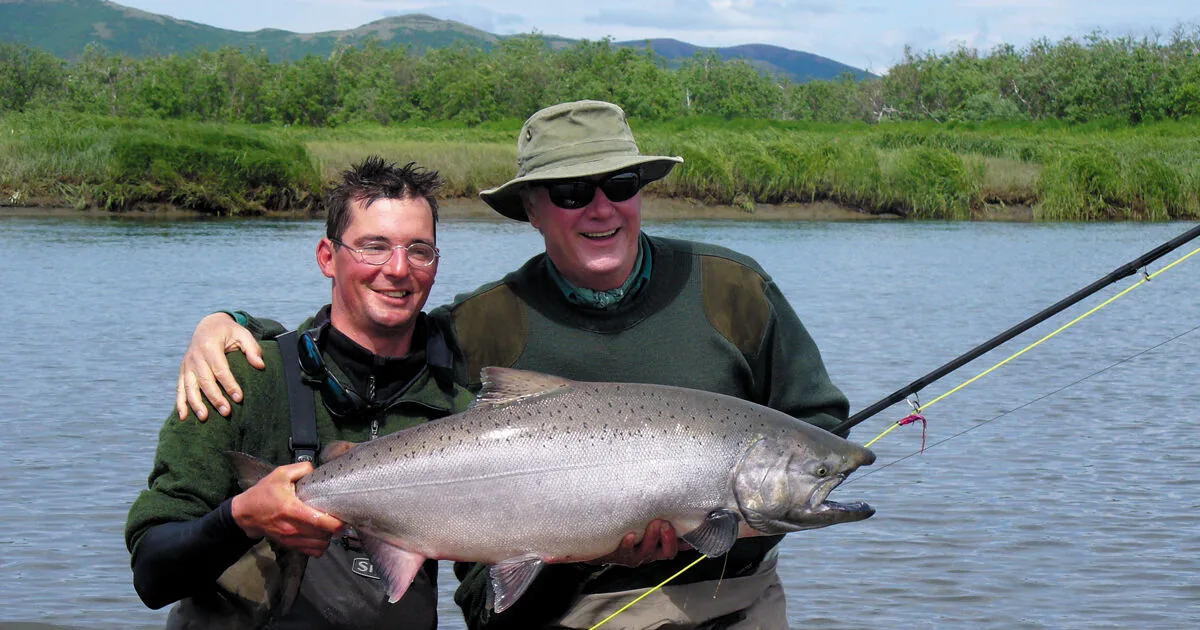 Guests with king salmon — Royal Coachman Lodge, Nuyakuk River, Bristol Bay, Alaska