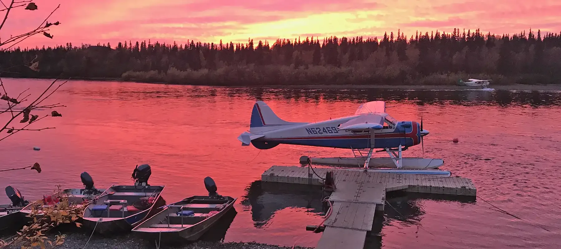 Sunset at the lodge dock — Royal Coachman Lodge, Nuyakuk River, Bristol Bay, Alaska