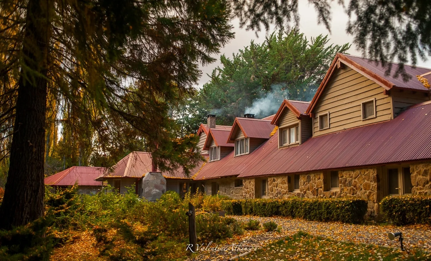 Tipiliuke Lodge autumn garden and yellow foliage, Chimehuín River, Patagonia, Argentina