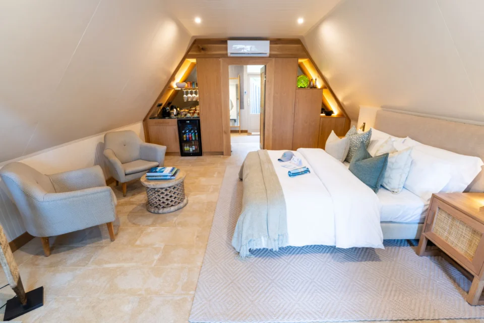 Beach bungalow bedroom — Alphonse Island, Seychelles