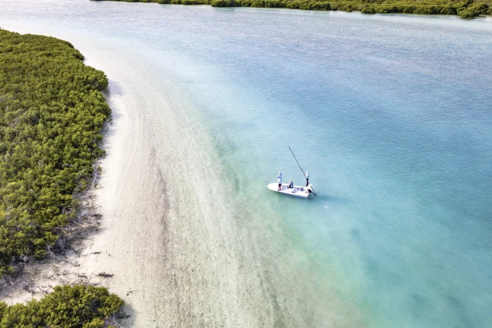 Aerial of a skiff on the beach flats — Astove Atoll, Seychelles