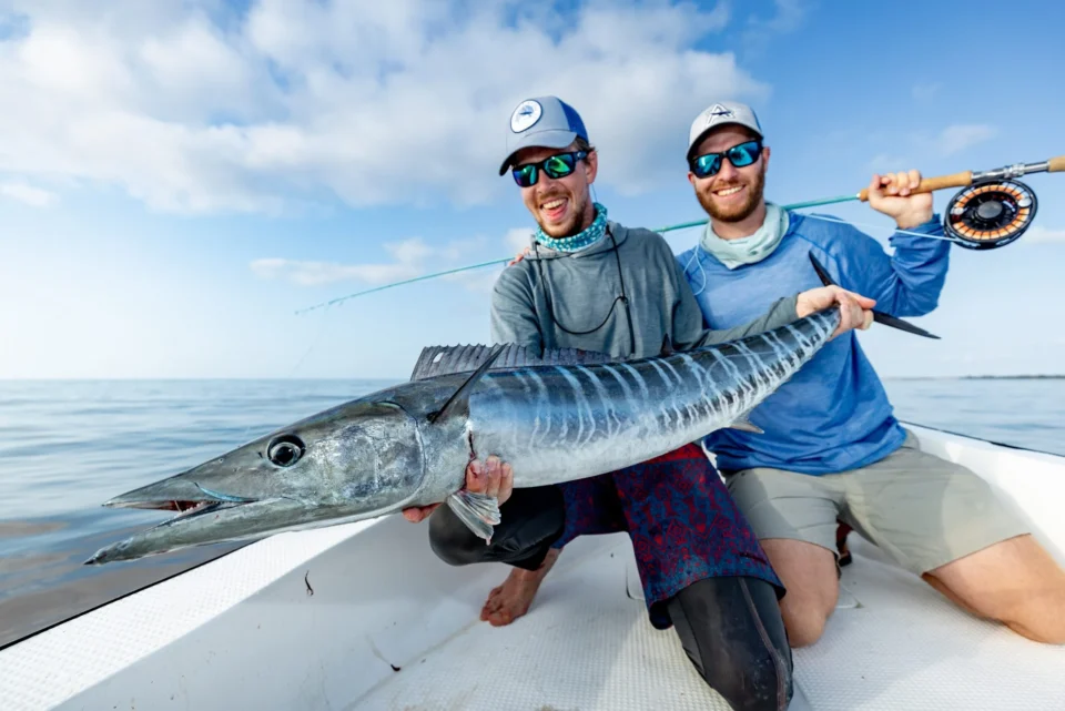 Two anglers with a wahoo — Astove Atoll, Seychelles