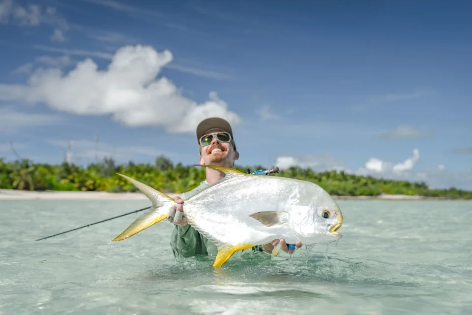 Angler with an Indo-Pacific permit — Farquhar Atoll, Seychelles