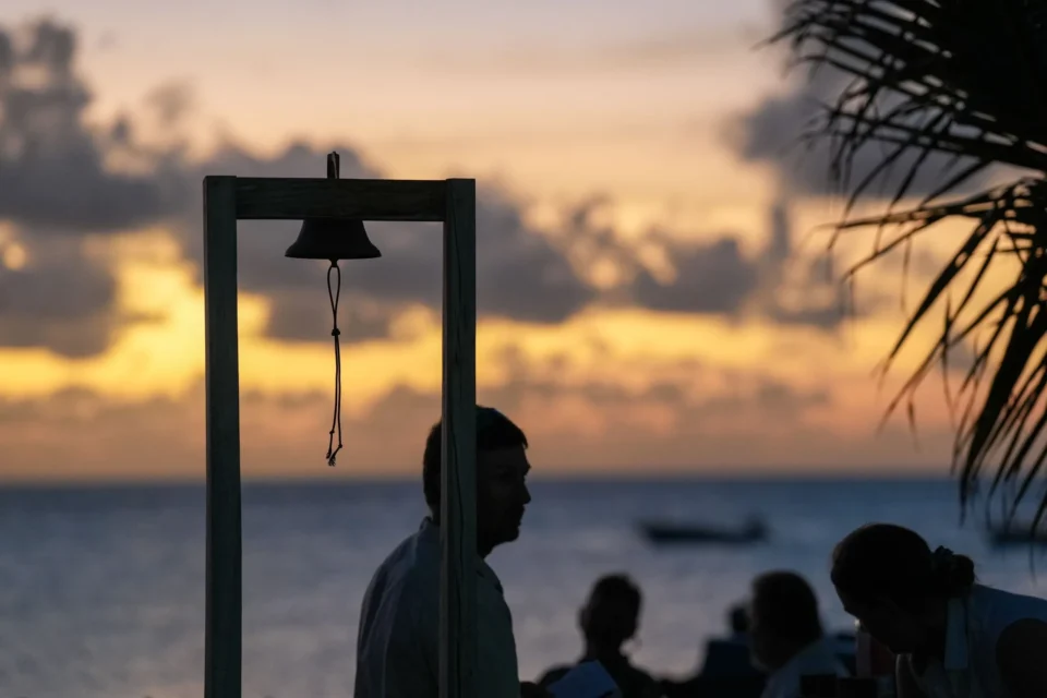 Sundowners by the lodge bell — Farquhar Atoll, Seychelles