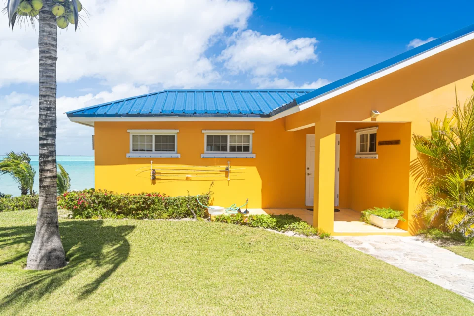 Guest cottage with outdoor fly-rod racks at Mangrove Cay Club, Andros, Bahamas