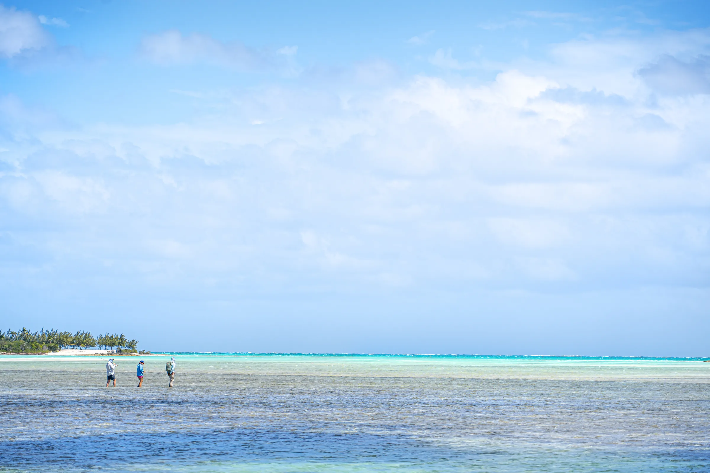 Anglers wading bonefish flats at Mangrove Cay Club, Andros, Bahamas