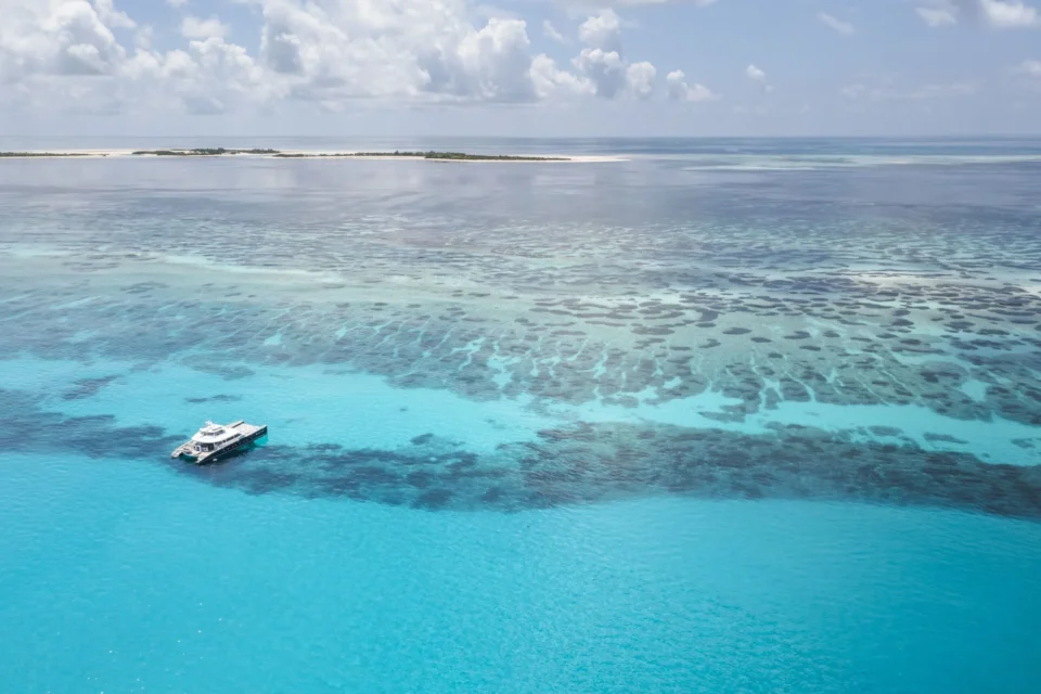 Aerial of the mothership at the reef edge — Providence Atoll, Seychelles