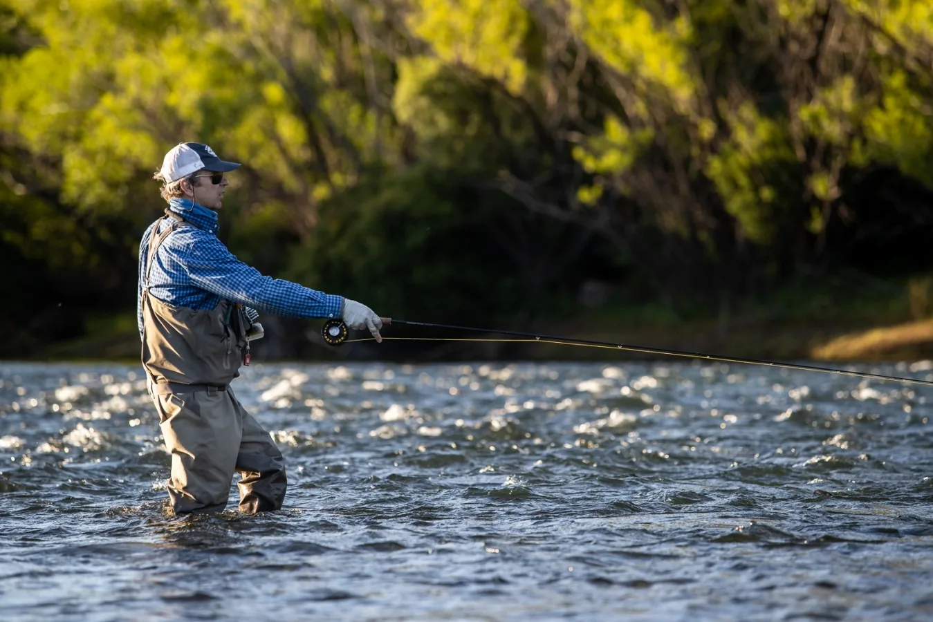 Anglers wading the Chimehuín River at Tipiliuke Lodge, Patagonia, Argentina