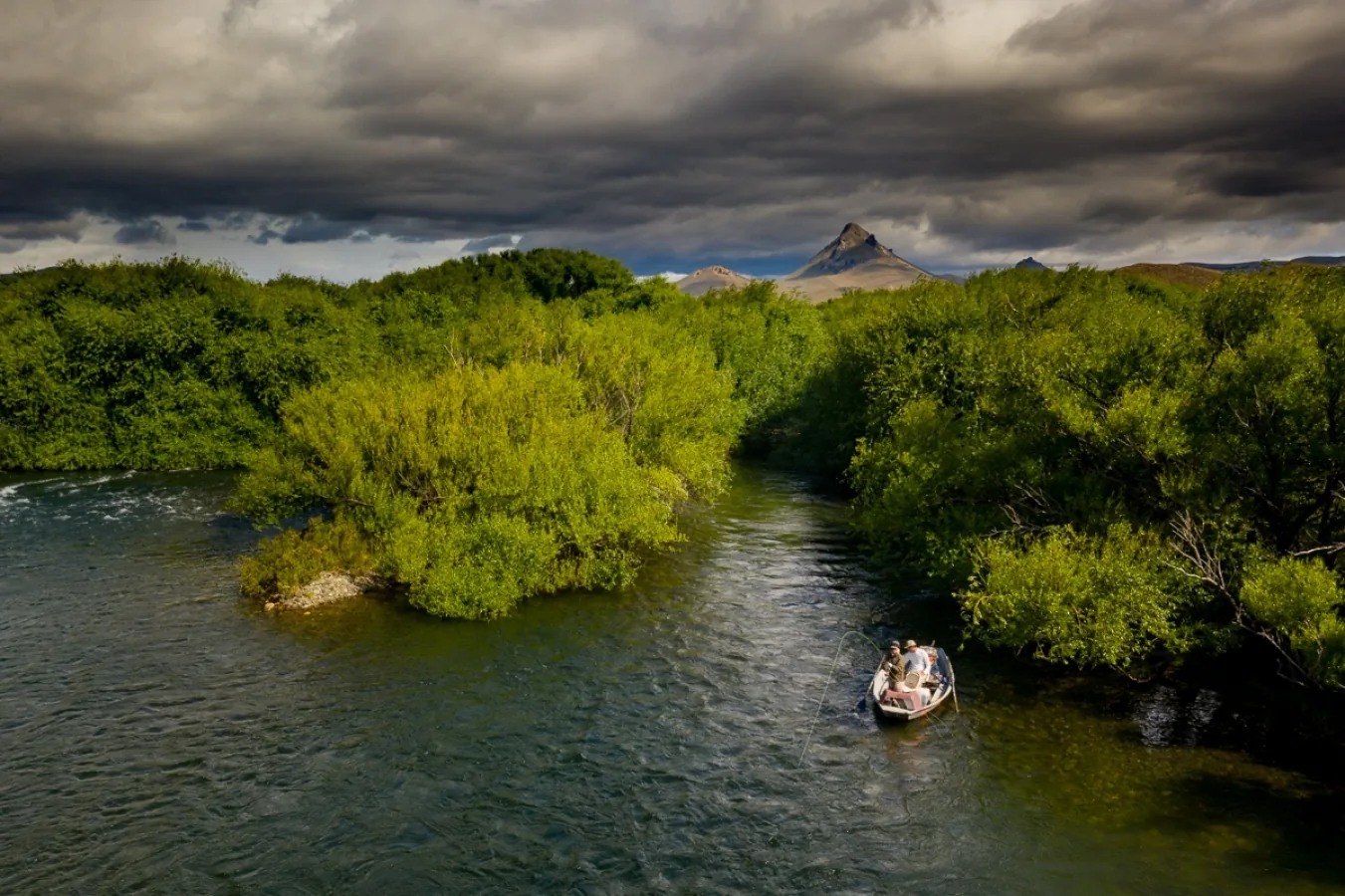 Drift boat on a bend of the Chimehuín River at Tipiliuke Lodge, Patagonia, Argentina